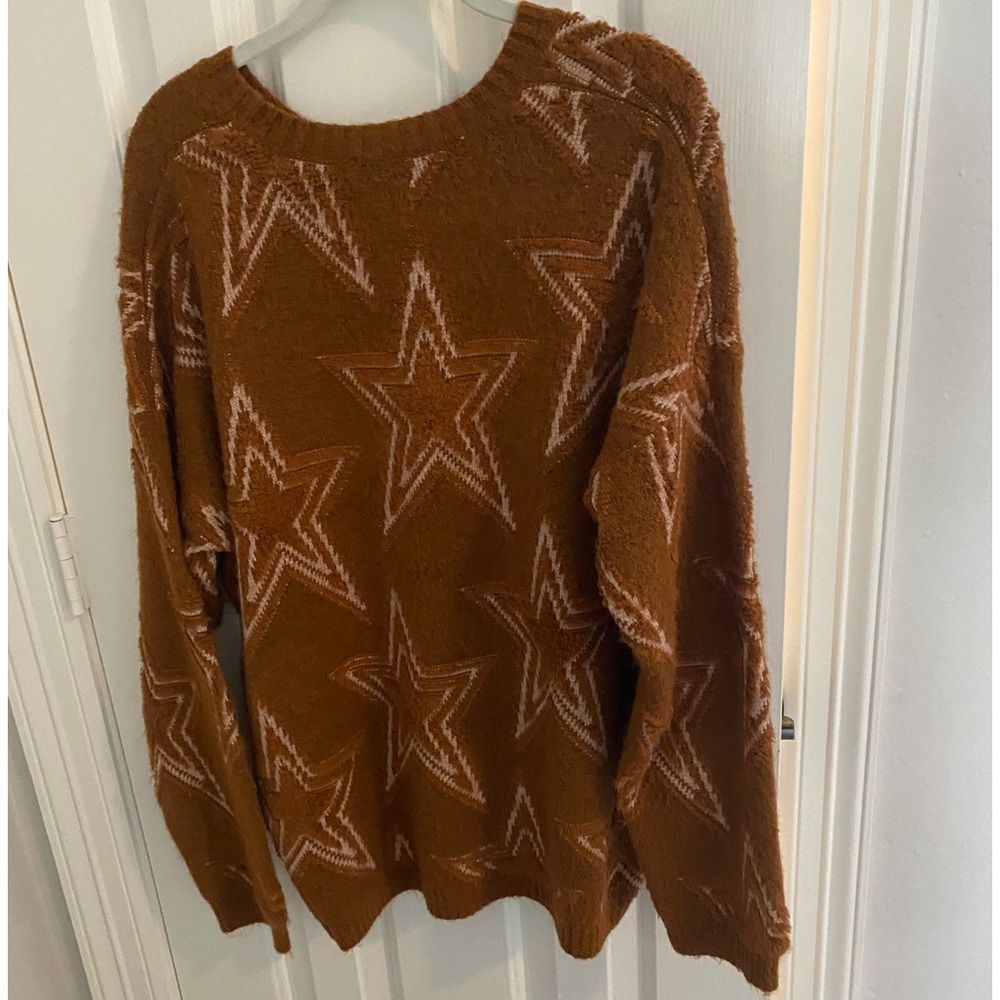 Orange color star fun sweater.